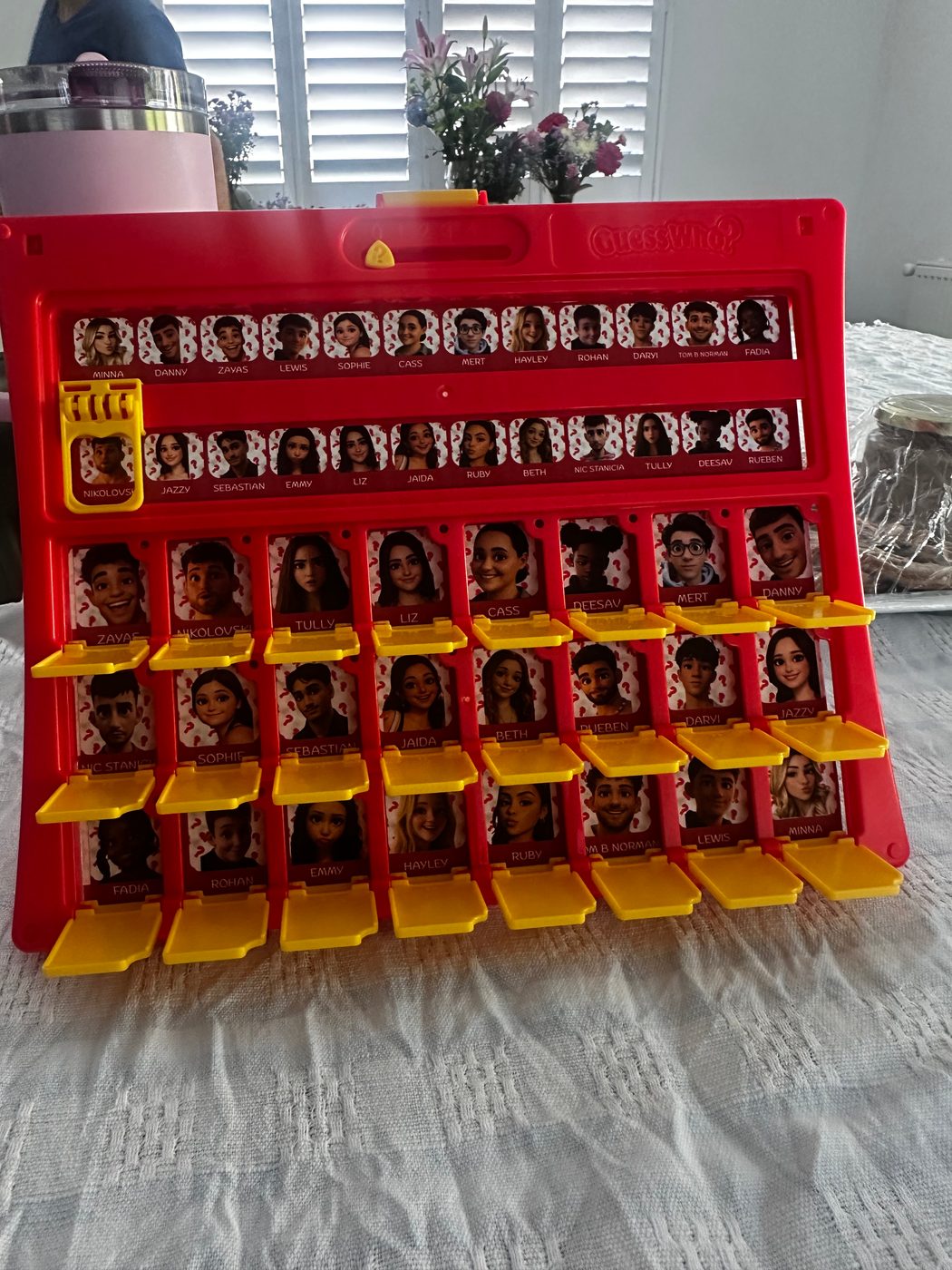 Personalised Guess Who? game board with friends' faces and custom names